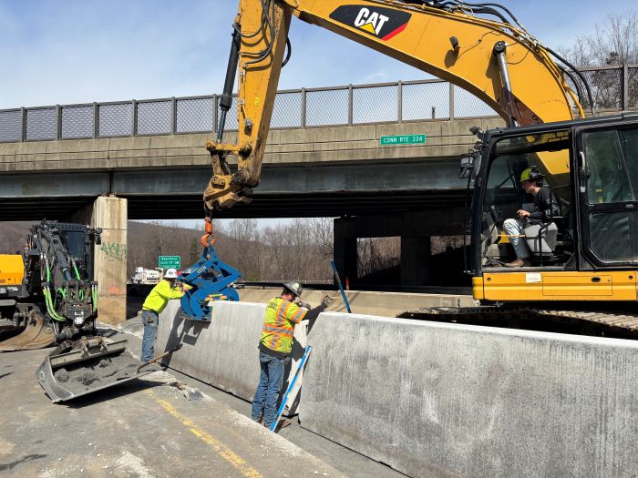 Photo of installation of new precast median barrier