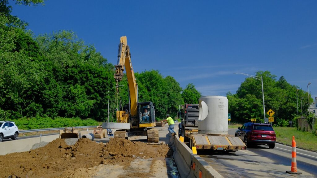 Construction equipment working in the median on Route 8